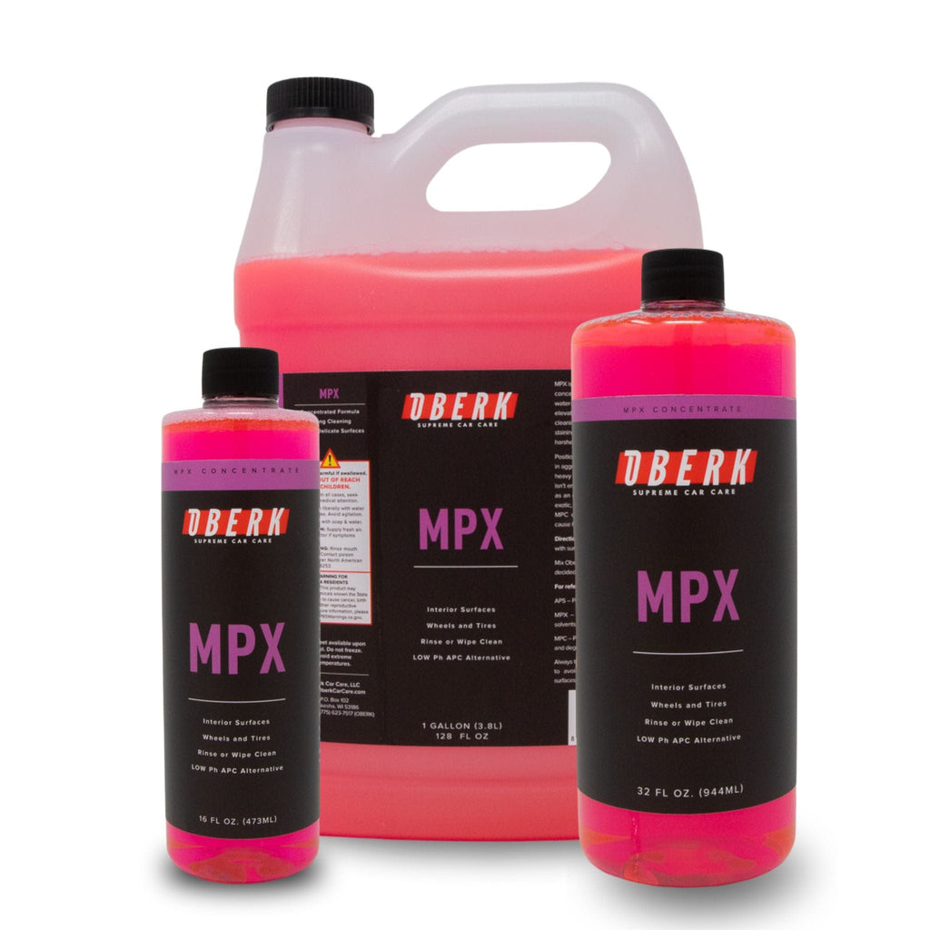 Three bottles of Oberk MPX with a large container in the background on a white background - MPX group of all sizes